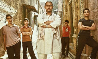 'Dangal' Second Poster: Aamir Khan and his daughters pack a punch