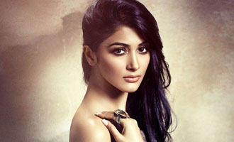 Pooja Hegde caught by travelling bug