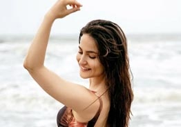 Dhanush film actress raises mercury level while soaking in the sea!