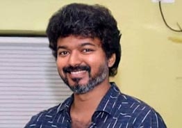 Thalapathy Vijay Takes Off to USA for 'GOAT' Shoot - Airport Sighting Sparks Social Media Frenzy!