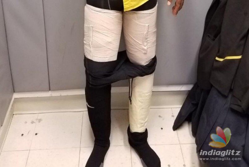 Airline worker arrested for smuggling cocaine taped around legs