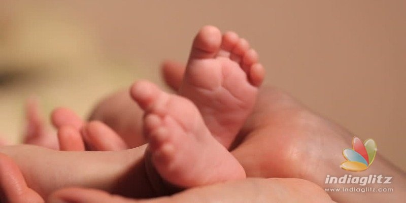 Picture: Woman gives birth to baby with two faces and three hands