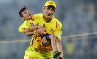 Whoa! Dhoni turns into a child and plays with teammates sons - video