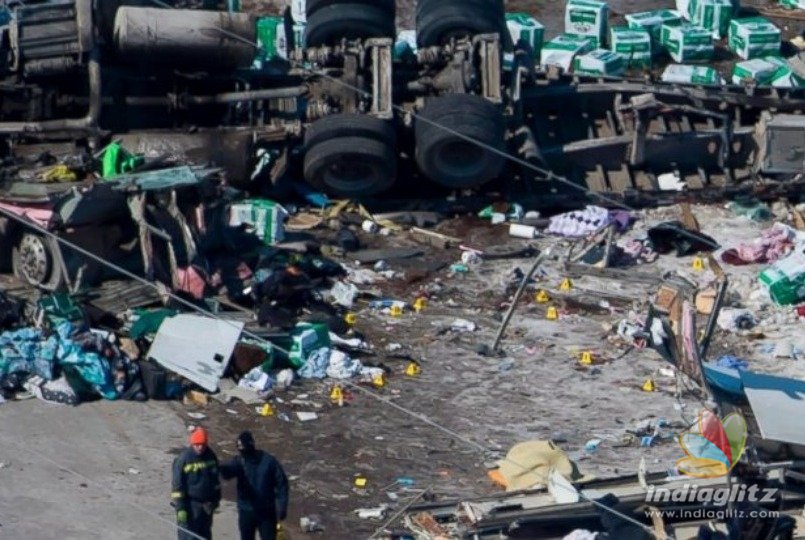 15 dead as bus carrying hockey players crashes with a tractor 