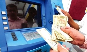 People gathered at an ATM centre after the machine dispensed Rs 2,500 instead of Rs 500!