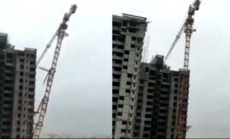 Fani cylone devastation - Video of giant construction crane falling on houses