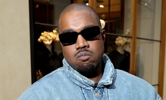 Kanye West has altercation with paparazzi at Charlie Wilson's Walk