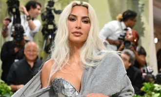 Kim Kardashian Stuns in Tight Corset and Sheer Gown: 2024 Met Gala Glam