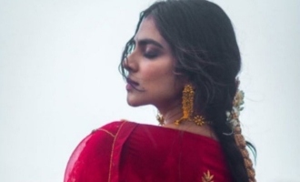 Malavika Mohanan goes to the beach and sizzles in a red saree for Onam special photoshoot