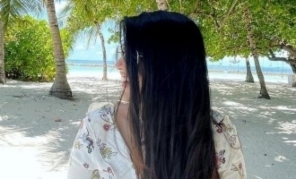 Actress Megha Akash Maldives vacation photos Yaadhum Oorey Yavarum Kelir update