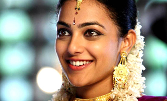 Nithya Menen becomes Nadigaiyar Thilagam