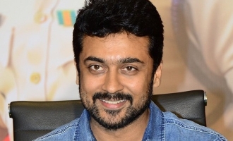 Suriya jumps over a gate to escape fans