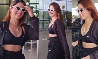 Tamannaah shakes legs for 'Kaavaalaa' with the paparazzi at the airport! - Video rocks the internet