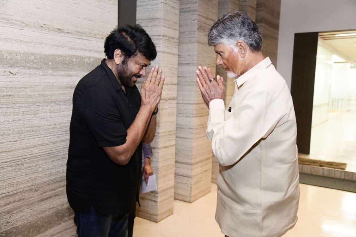 Chiranjeevi handover cheques for flood relief victims personally to AP CM Chandra Babu