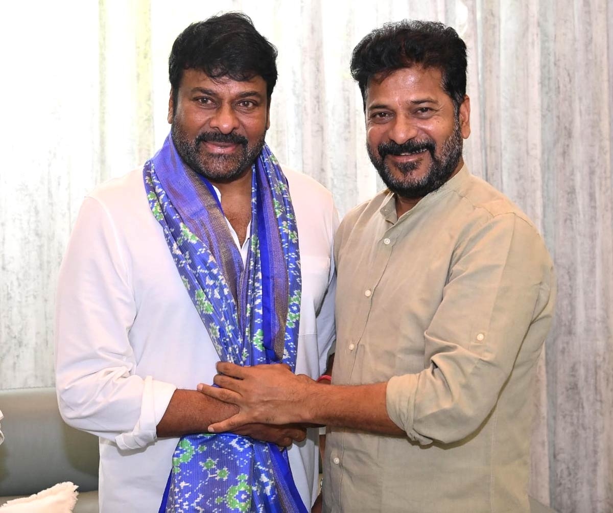 Chiranjeevi handover cheques for flood victims to CM Revanth Reddy