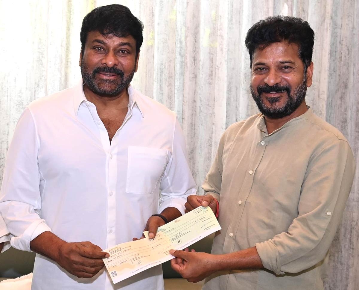 Chiranjeevi handover cheques for flood victims to CM Revanth Reddy