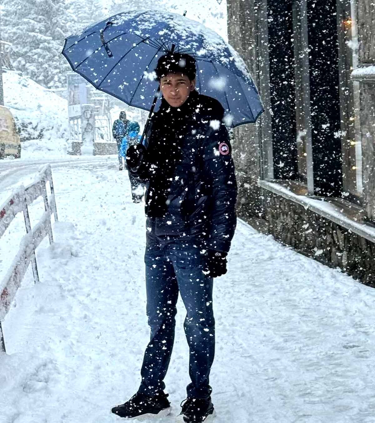 Namrata playful in the snow with Sitara and Gautham