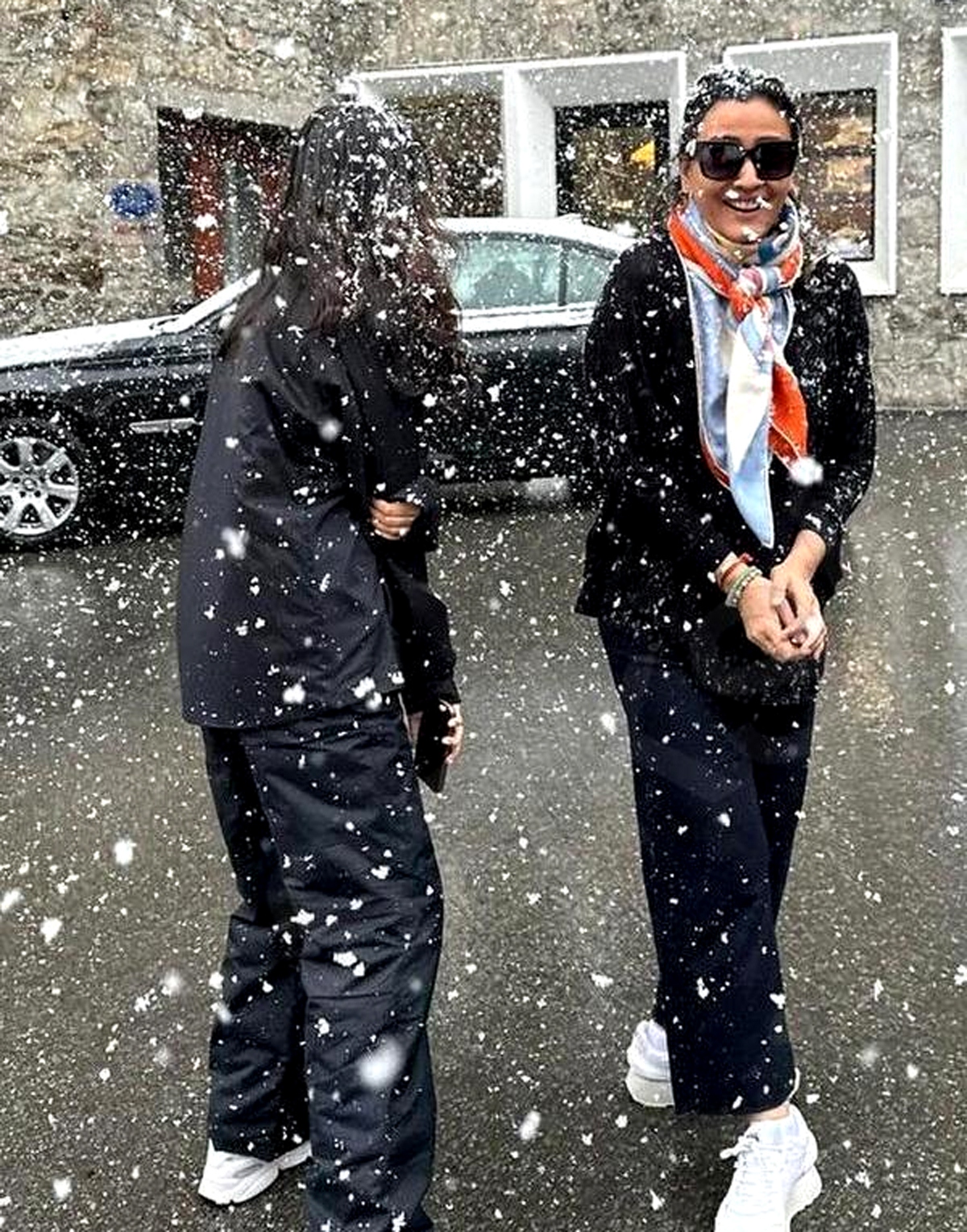 Namrata playful in the snow with Sitara and Gautham