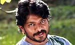 Tamil actor Parthiepan plays Cherry's father in Racha
